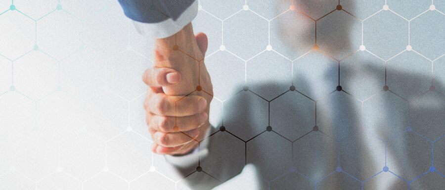 Corporate business handshake between partners